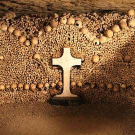 Paris: Catacombs Entry & Seine River Cruise with Audio Guide